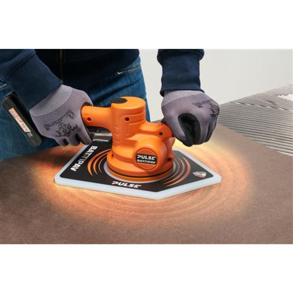 Battipav Pulse vibrating plate expelling air beneath ceramic tile