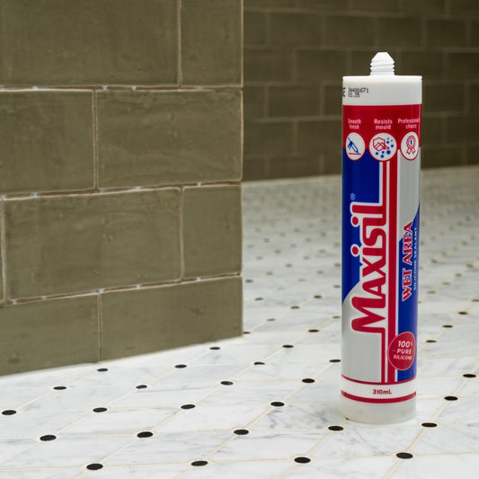Maxisil Wet Area Sealant tube close-up.